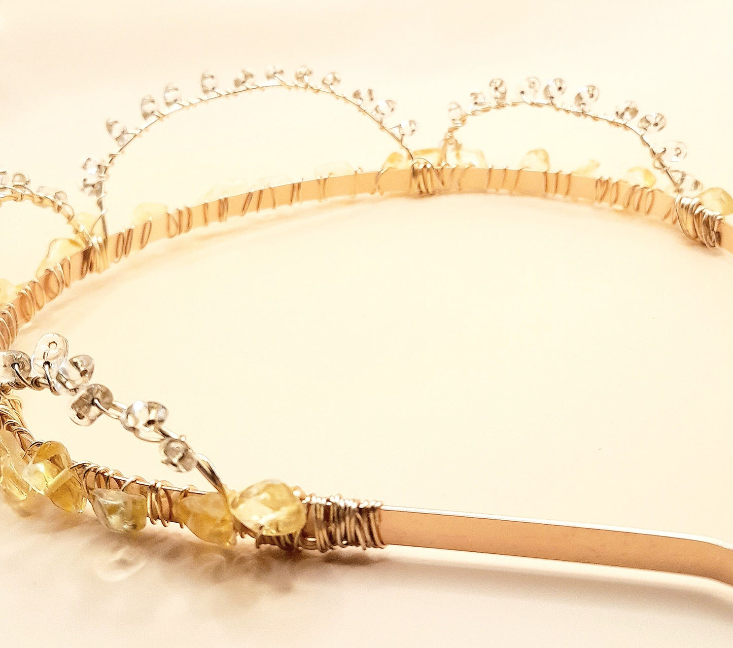 Handwired citrine with glass heads on gold headband that can also be worn as a crown back side image