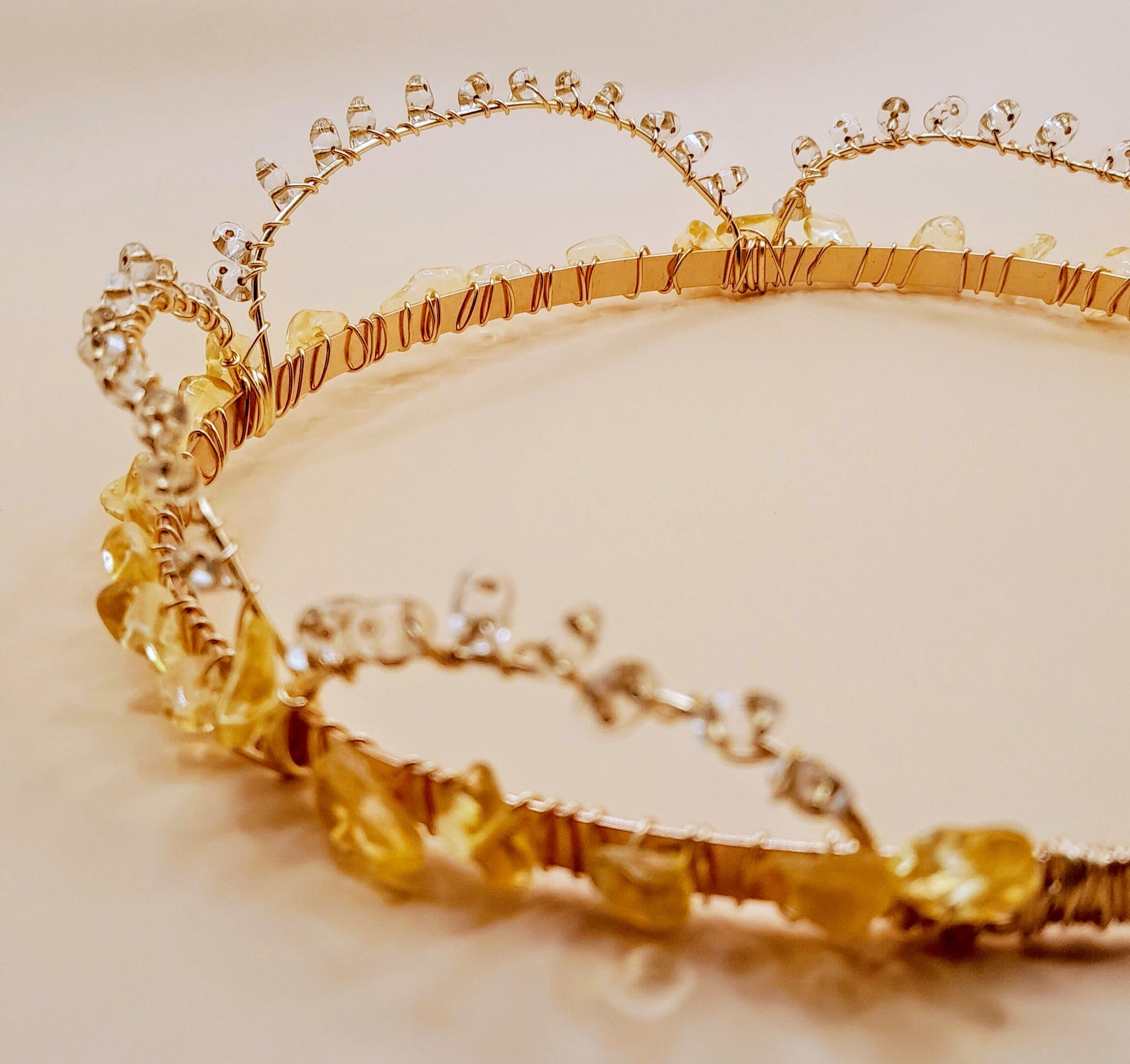 Handwired citrine with glass heads on gold headband that can also be worn as a crown back view from back side image